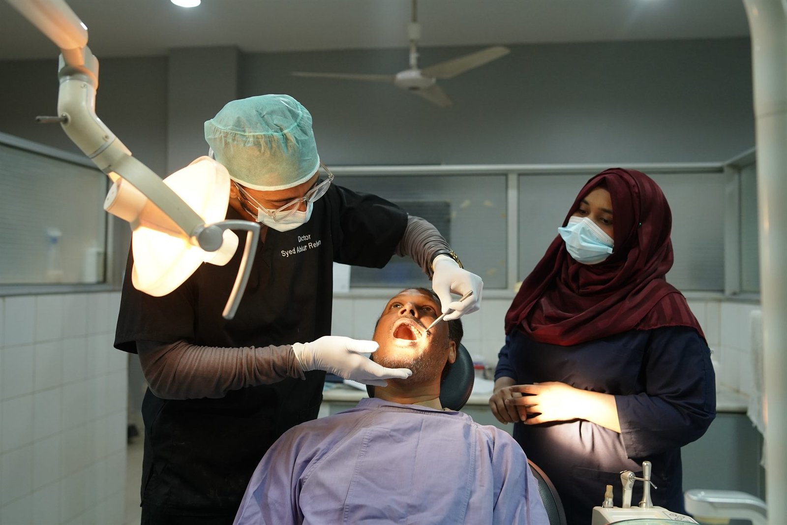 Dental procedure being performed on a patient in the PEBS Hospital Dental and Maxillofacial Unit
