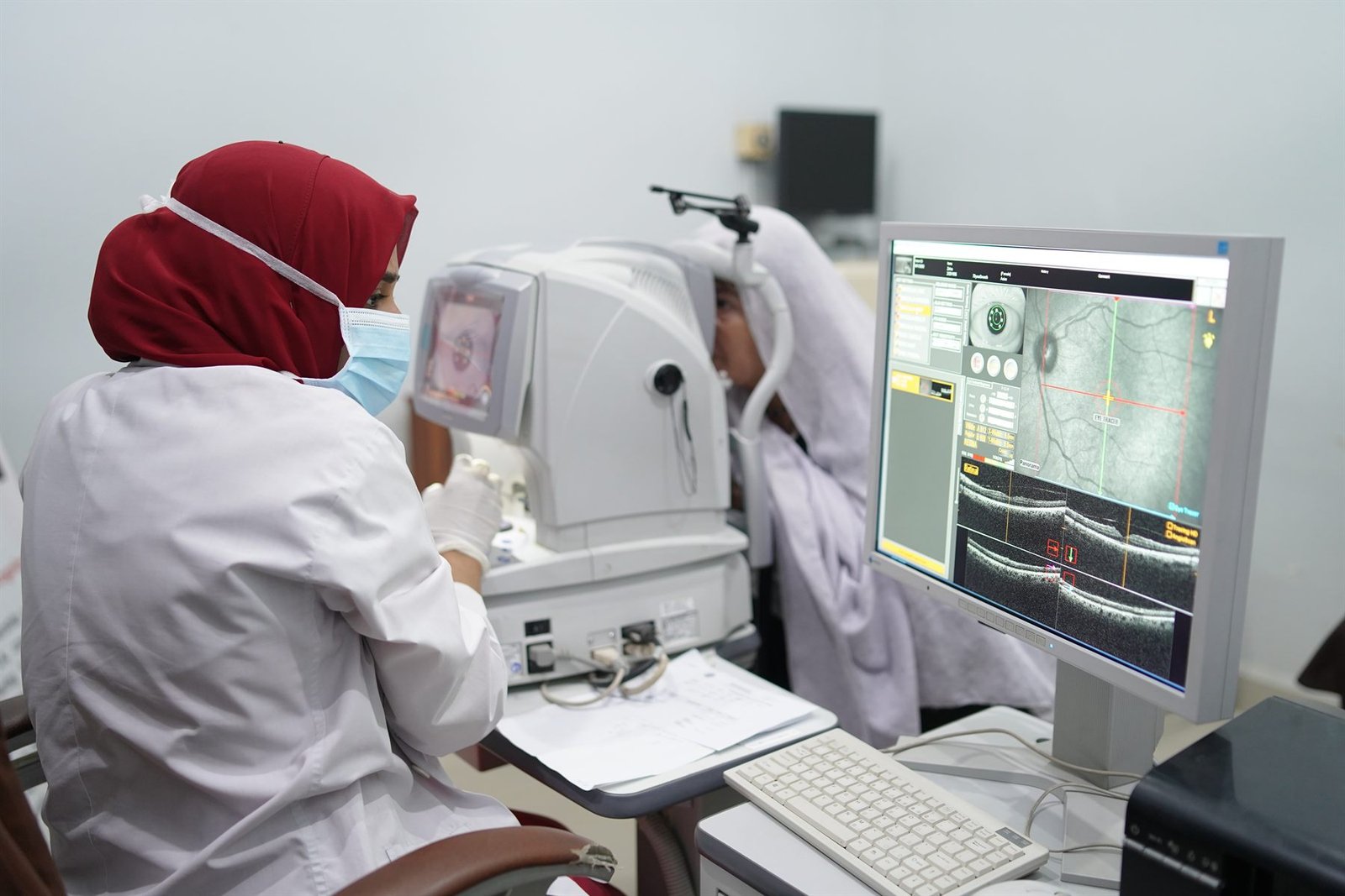 Optical coherence tomography scan being performed in the PEBS Hospital Eye Unit