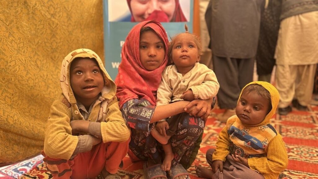 A mother and her children at a PEBS free eye camp